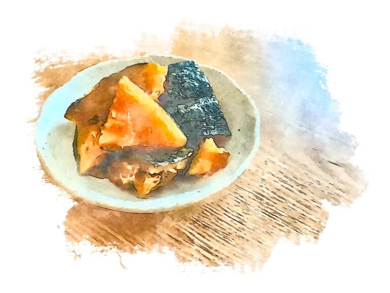 Watercolor-style illustration of braised kabocha squash pieces arranged on a cream-colored ceramic plate. The golden-orange squash segments show caramelized edges from braising, alongside what appears to be kombu seaweed. The artistic rendering emphasizes the natural colors and textures of this traditional shōjin ryōri preparation.