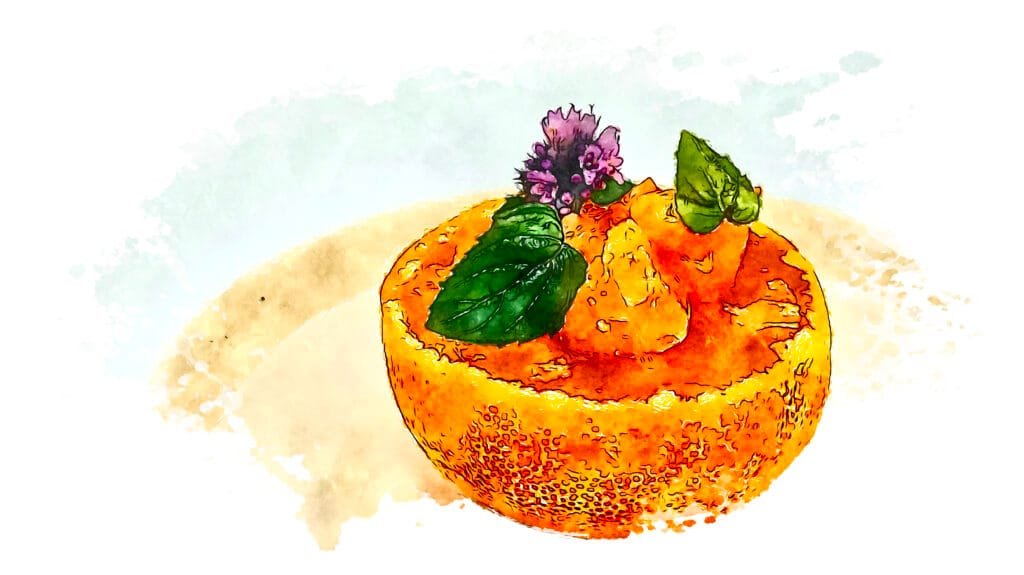 Mikan gelee garnished with mint and purple mint blossoms.