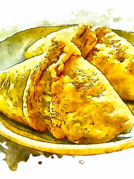 Two pieces of inari sushi filled with rice seasoned with yuzu on an off-white ceramic plate.