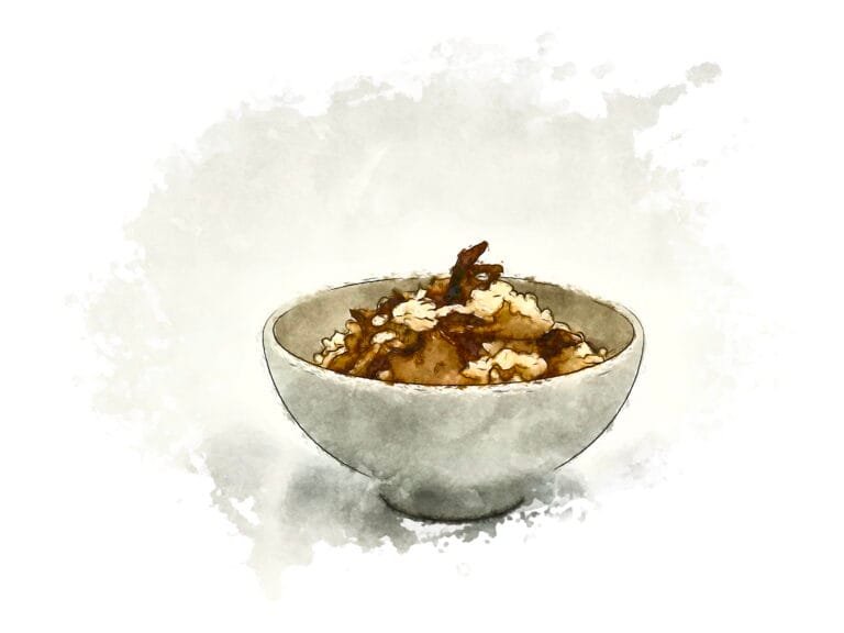 A white ceramic bowl filled with warm maitake mushroom rice.