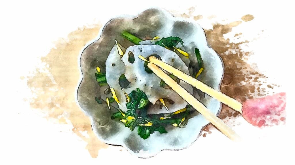 Lotus root and chrysanthemum greens salad being garnished with bright yellow flower petals.