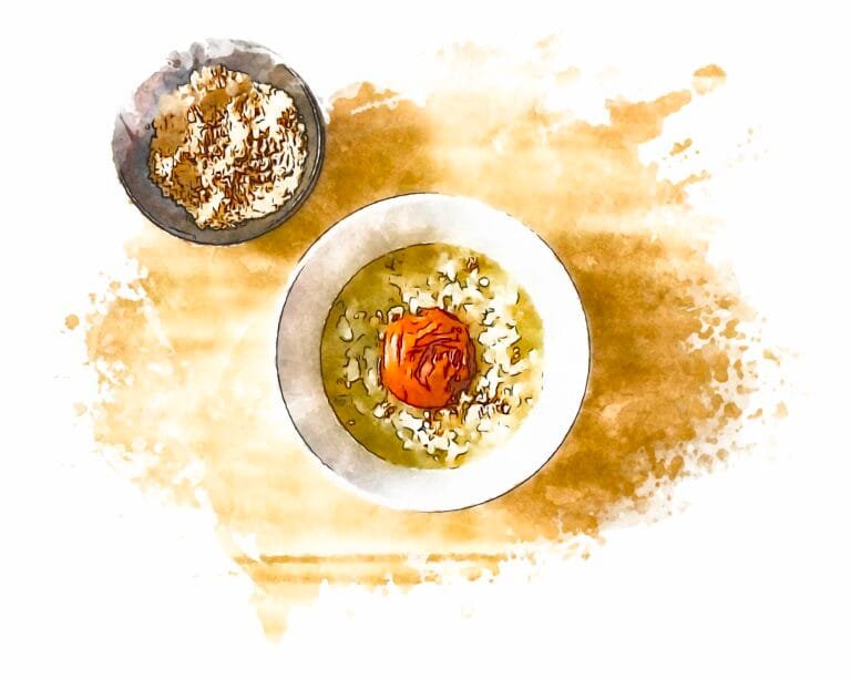A bowl of okayu rice porridge with an umeboshi plum in the center, and sesame salt served on the side.